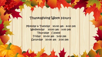 Fall leaf border around text stating thanksgiving week hours